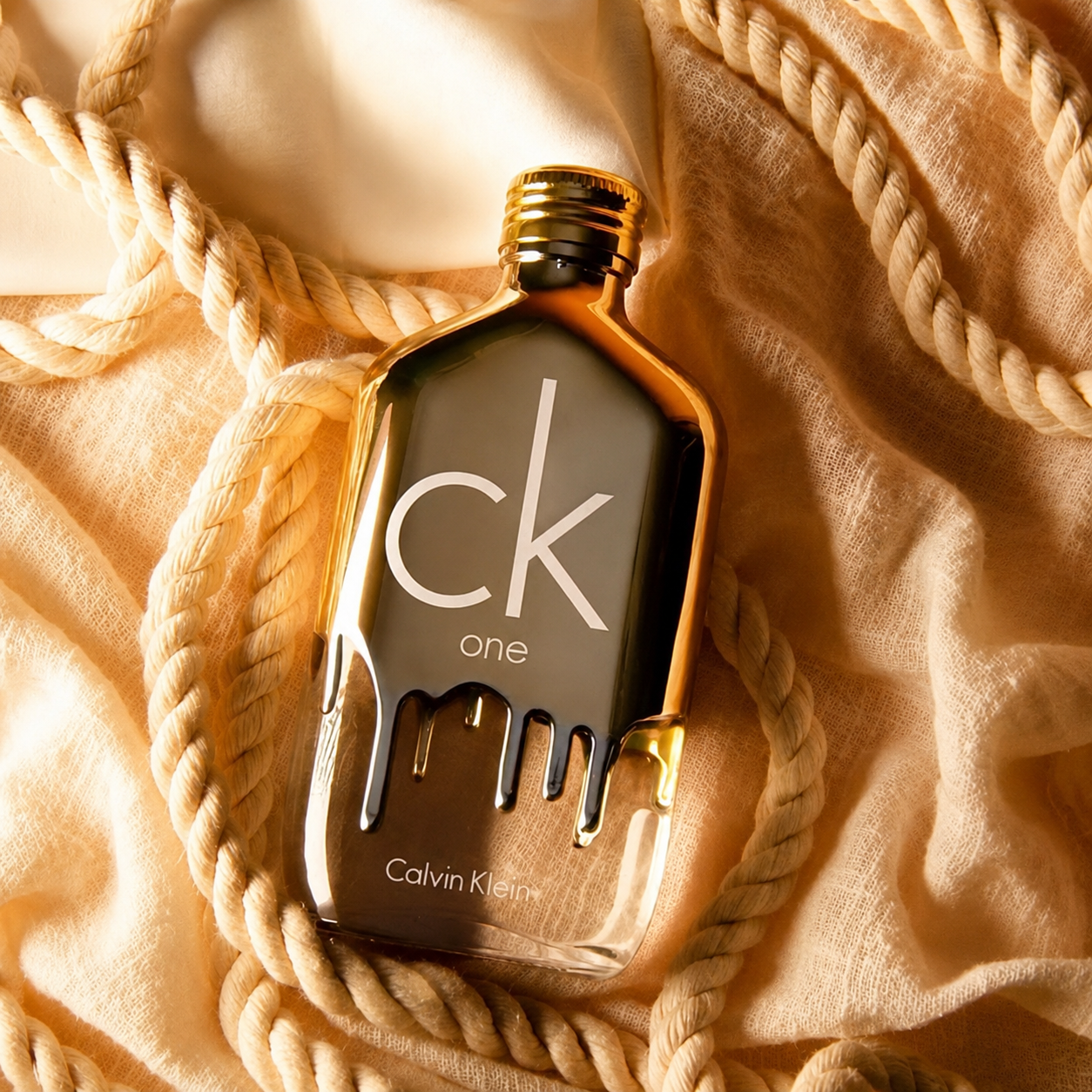 عطر ادوتویلت یونیسکس کالوین کلین مدل سی کی وان گلد با رایحه معتدل_خنک و شیرین